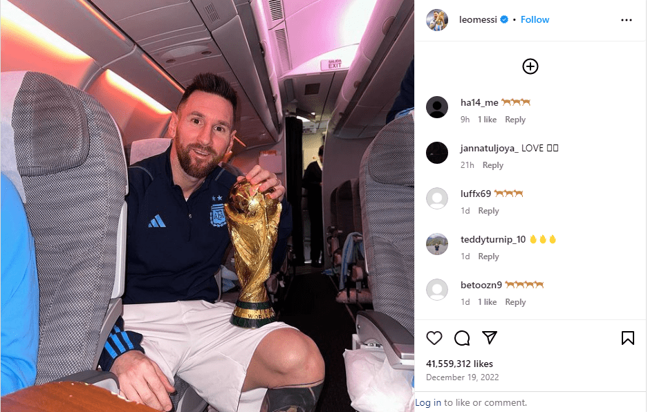 5- Messi holding The World Cup Trophy in an airplane